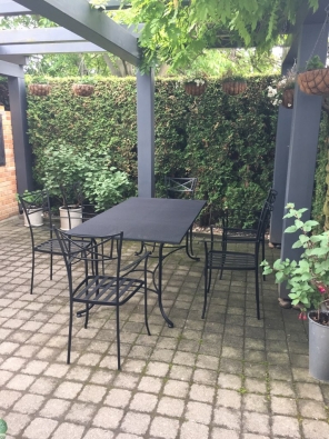 Table top made of expanded metal. Iron furniture for your garden.